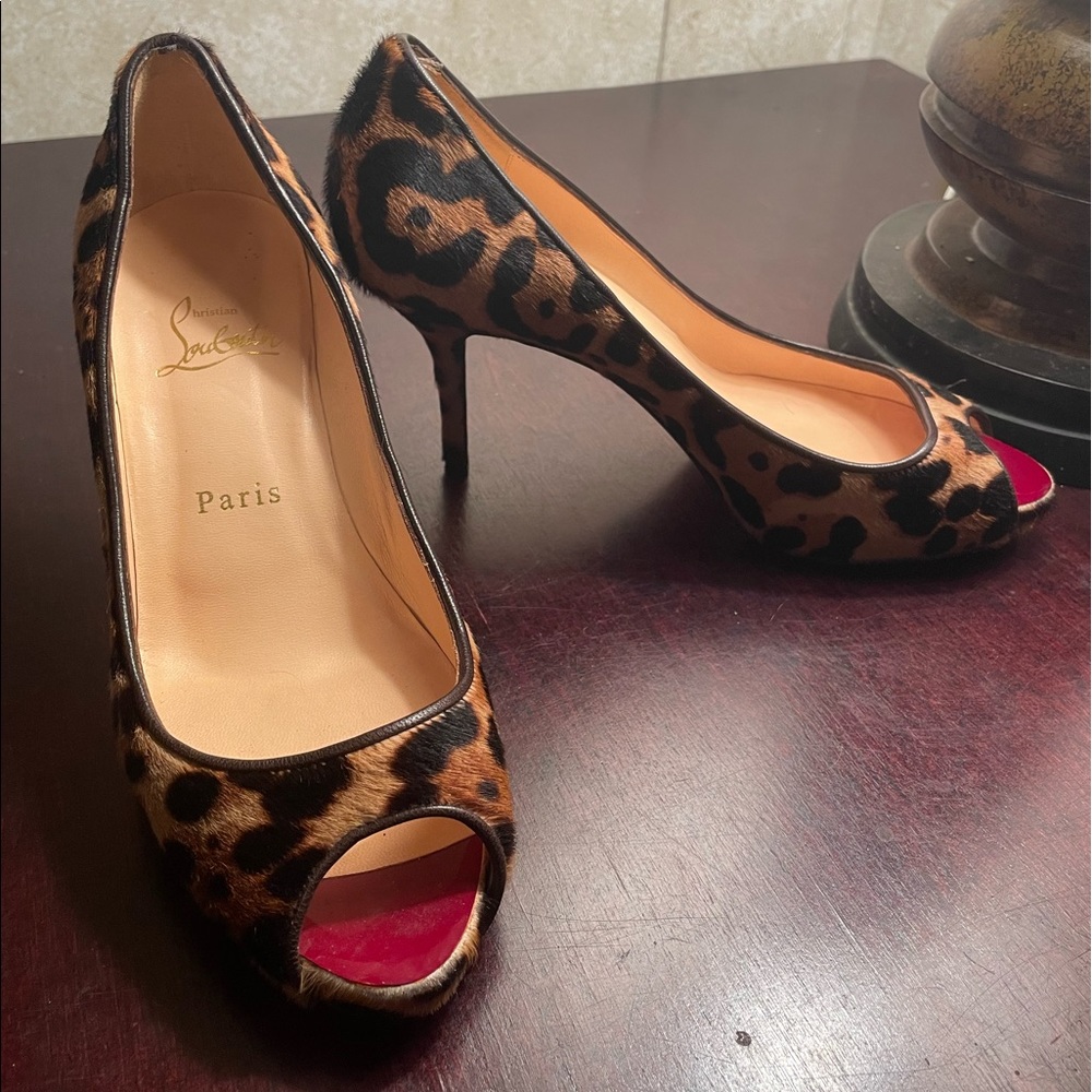 Authentic Christian Louboutin Cheetah Pigalles
Follies Pumps
